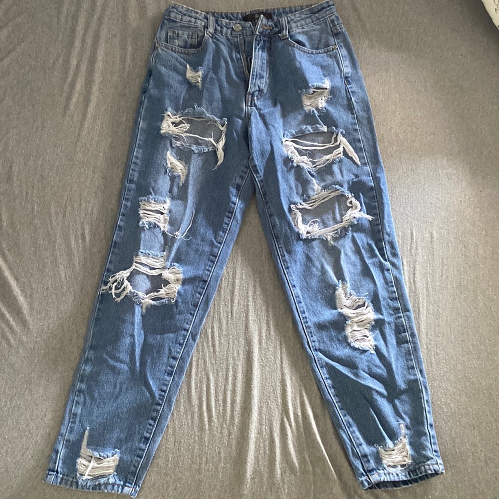 Woman’s Petite ripped jeans